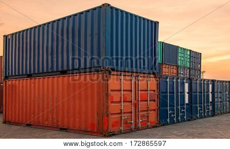 container ship in import export and business logistic.By crane Trade Port Shipping.Tugboat assisting cargo to harbor.