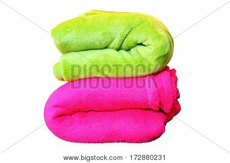 stack of colorful blankets pink and green isolated over white objects for your design