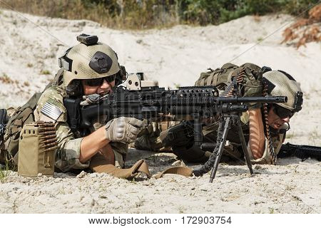 Members of US Army Rangers machinegun crew during the fight in the desert