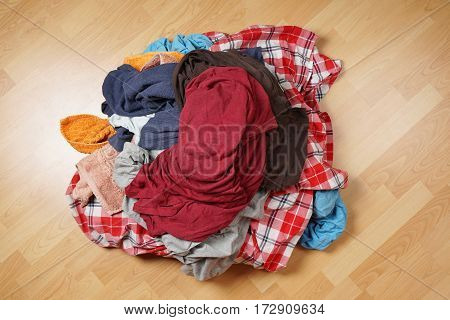 top view of dirty laudry pile on floor