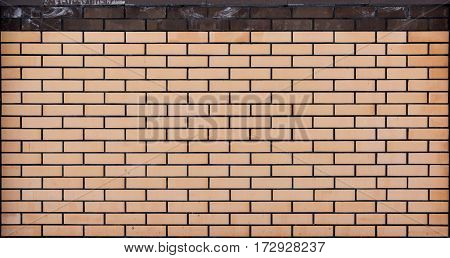 Beige brown brick wall modern background texture