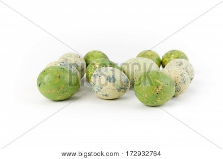 Quail eggs isolated on white background studio shot front view