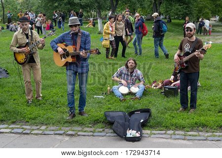 Kiev Ukraine - May 212016: Youth group playing in the park on a day off