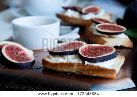 Bruschetta with the chease and fresh raw figs.