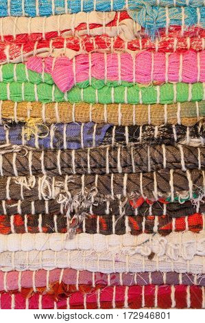 Colorful carpet texture. Background of andalusian carpet. Jarapa. Handmade carpet. Close up of beautiful hand made carpet. Abstract background and texture for designers.