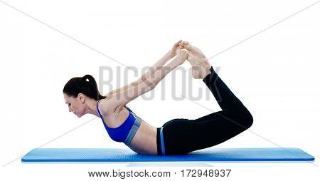 one caucasian woman exercising fitness pilates exercices isolated on white background