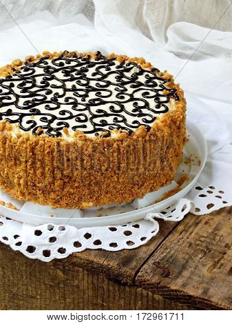 Homemade Cake With Nut Meringue Butter Cream And Decorated With Swirls Of Dark Chocolate. Kyiv Cake