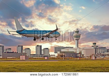 Airplane landing on Schiphol airport in Amsterdam in the Netherlands