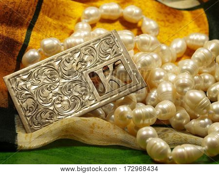 Antique silver carve into breastpin and pearls