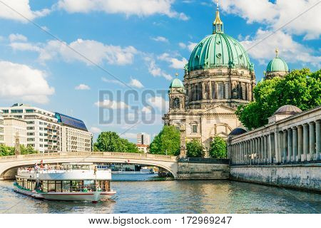 Berlin Cathedral , Berliner Dom, at famous Museum Island , Museumsinsel, with excursion boat on Spree river, Germany