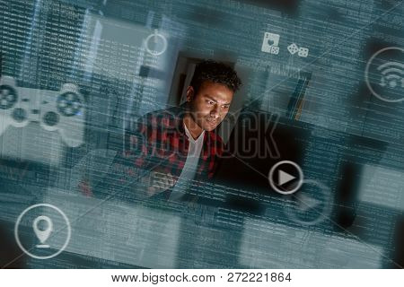 Young Concentrated Indian Computer Developer Writing New Code