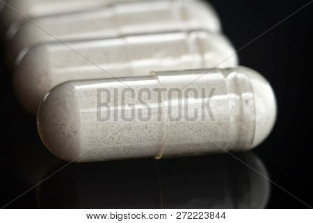 White Medical Capsules Of Glucosamine Chondroitin, Healthy Supplement Pills, Macro Image.