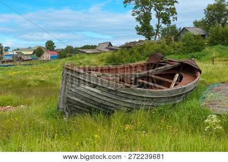 Old Broken Boat Lies On The Shore, Solovetsky Islands, Arkhangelsk Region, Russia