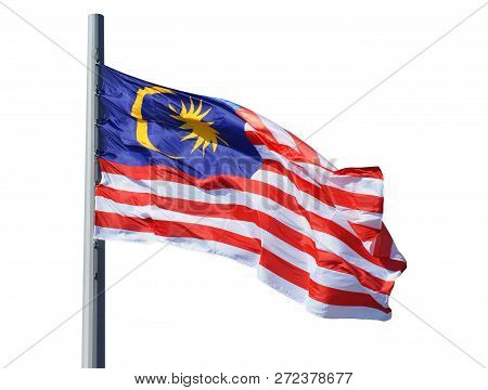 Malaysian Flag On A Flagpole Isolated On White Background