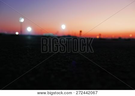 A Closeup Of The Street With An Amazing Dusk Sky Background