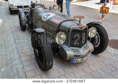Saalbach-hinterglemm, Austria - June 21 2018: Vintage Alvis Oldsmobile Veteran Car Standing On Stree