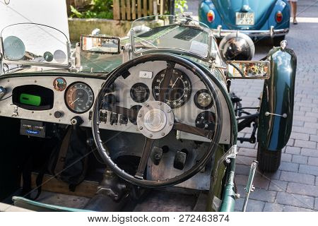 Saalbach-hinterglemm, Austria - June 21 2018: Vintage Alvis Oldsmobile Veteran Car Standing On Stree
