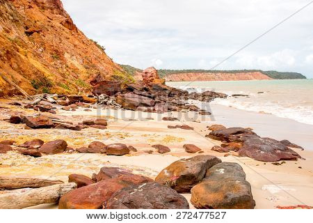 Red Rocks Along The Northeast Coast Beaches Of Brazil, In The State Of Alagoas