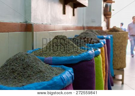 Seeds And Spices In Canvas Bags At The Traditional Souk Market In The Medina Or Old Town Of Marrakec