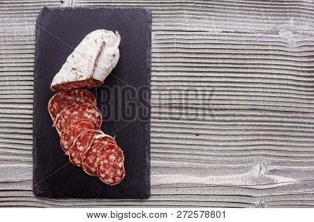 Saucisson Sec Delicious French Salami On A Wooden Background