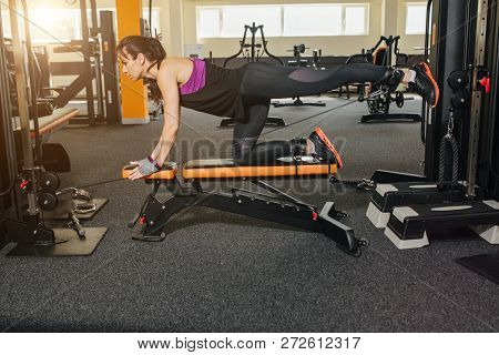 Fitness Woman Doing Lunges Exercises For Leg Muscle Workout Training In Gym.