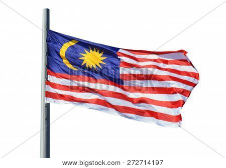 Malaysian Flag On A Flagpole Isolated On White Background