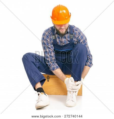 Young Man Builder With Toolbox Industry Worker Hardhat Pain Leg On White Background Isolation