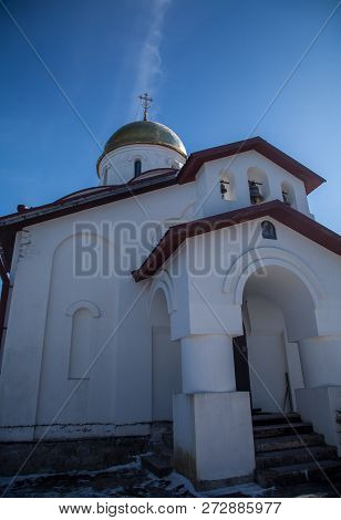 The Church Against The Blue Sky In Winter