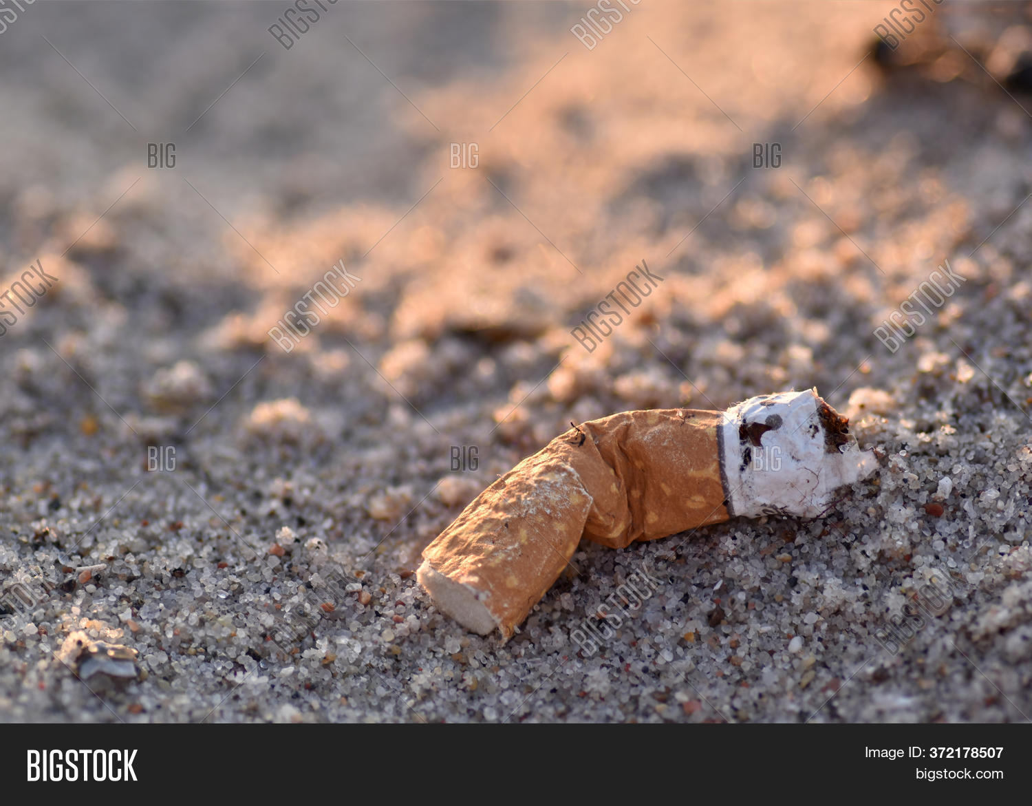 cigarette sand Closeup Old Weathered Image & Photo (Free Trial)