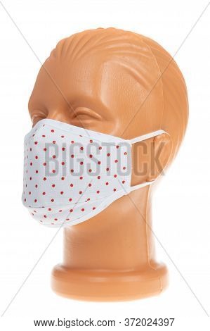 White Mask With Red Dots On Mannequin Head. Protective Face Mask. Corona Virus, Covit-19 Protection.