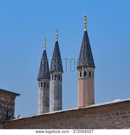 Minaret Shaped Ornaments, Small Towers Above Wall Of Topkapi Palace Instanbul