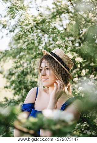 Sensual Calm Portrait Of Beautiful Hipster Woman In Blooming Bush With White Flowers Of Spirea. Copy