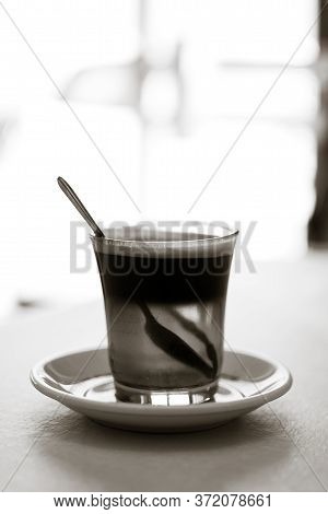 Coffee With Three Colors, Brown Black And Yellow White And Black
