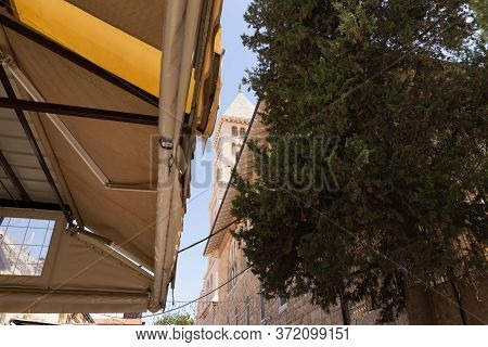 Jerusalem, Israel, June 13, 2020 : View From Muristan Street To The Bell Tower Of The Lutheran Churc