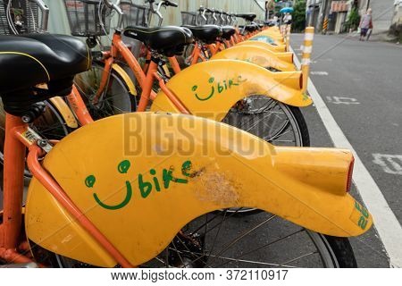New Taipei city, Taiwan - June 14th, 2020: Ubike, a bike sharing system service used by citizens as short-distance transit vehicles at street in New Taipei city, Taiwan
