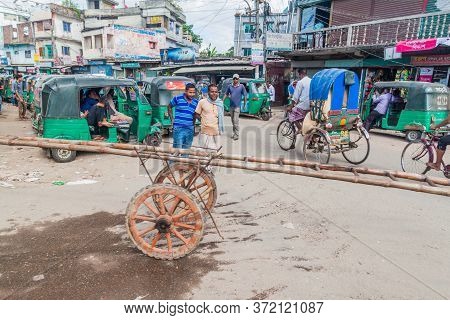 Bogra, Bangladesh - November 7, 2016: Various Vehicles On A Street In Bogra, Bangladesh.