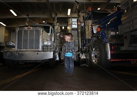 Vancouver Island, British Columbia Canada, June 3, 2020: Bc Ferries Carry A Family With Vehicles As 