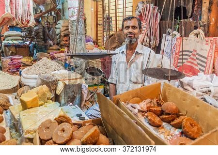 Khulna, Bangladesh - November 12, 2016: Local Seller At A Market In Khulna, Bangladesh