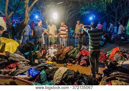 Pasur, Bangladesh - November 13, 2016: Clothing Seller During Rash Mela Festival At Dublar Char Dubl