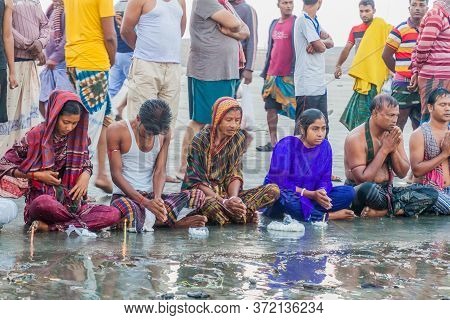 Dublar Char, Bangladesh - November 14, 2016: Hindu Devotees Praying Before Their Holy Dip During Ras