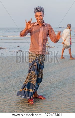 Dublar Char, Bangladesh - November 14, 2016: Hindu Devotee On A Beach During Rash Mela Festival At D