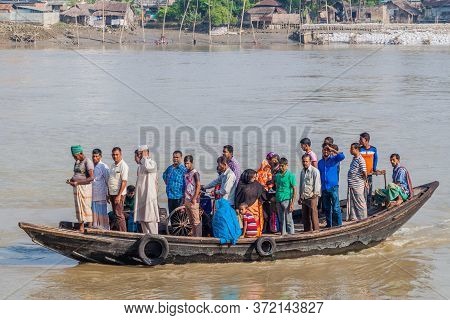Khulna, Bangladesh - November 16, 2016: People On A Ferry On Rupsa River In Khulna, Bangladesh