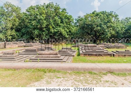 Tombs At The Grounds Of Choto Shona Mosque Small Golden Mosque In Bangladesh