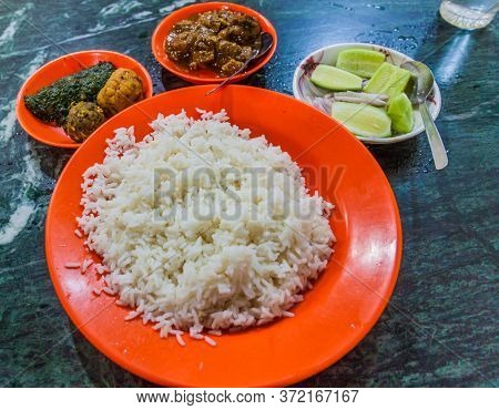 Meal In Bangladesh - Rice, Alo Vorta, Shim Borta And Chicken Curry