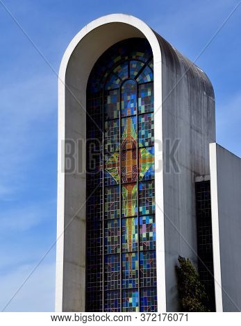 Cross Depicted In Front Window Of Church