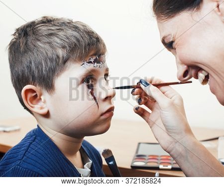 Little Cute Child Making Facepaint On Birthday Party, Zombie Apocalypse Facepainting, Halloween Prep