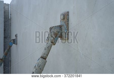 The Steel Arm Supporting On The Precast Concrete Wall