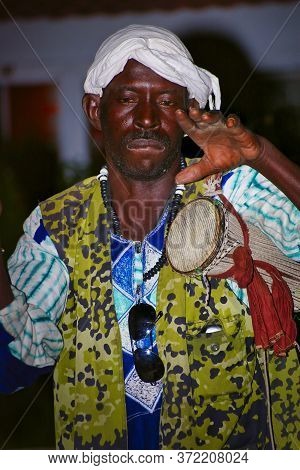 Senegal, Africa - Marsch Circa, 2016. Unidentified Black Man Playing Traditional African Music Durin