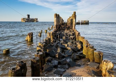 Breakwaters At Baltic Sea. The Old Torpedo Station In Babie Doly. Poland, Europe.