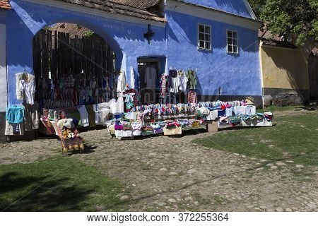 Viscri, Romania - April 29, 2018: Traditional Shop In Viscri, Fortified Town View In A Spring Day